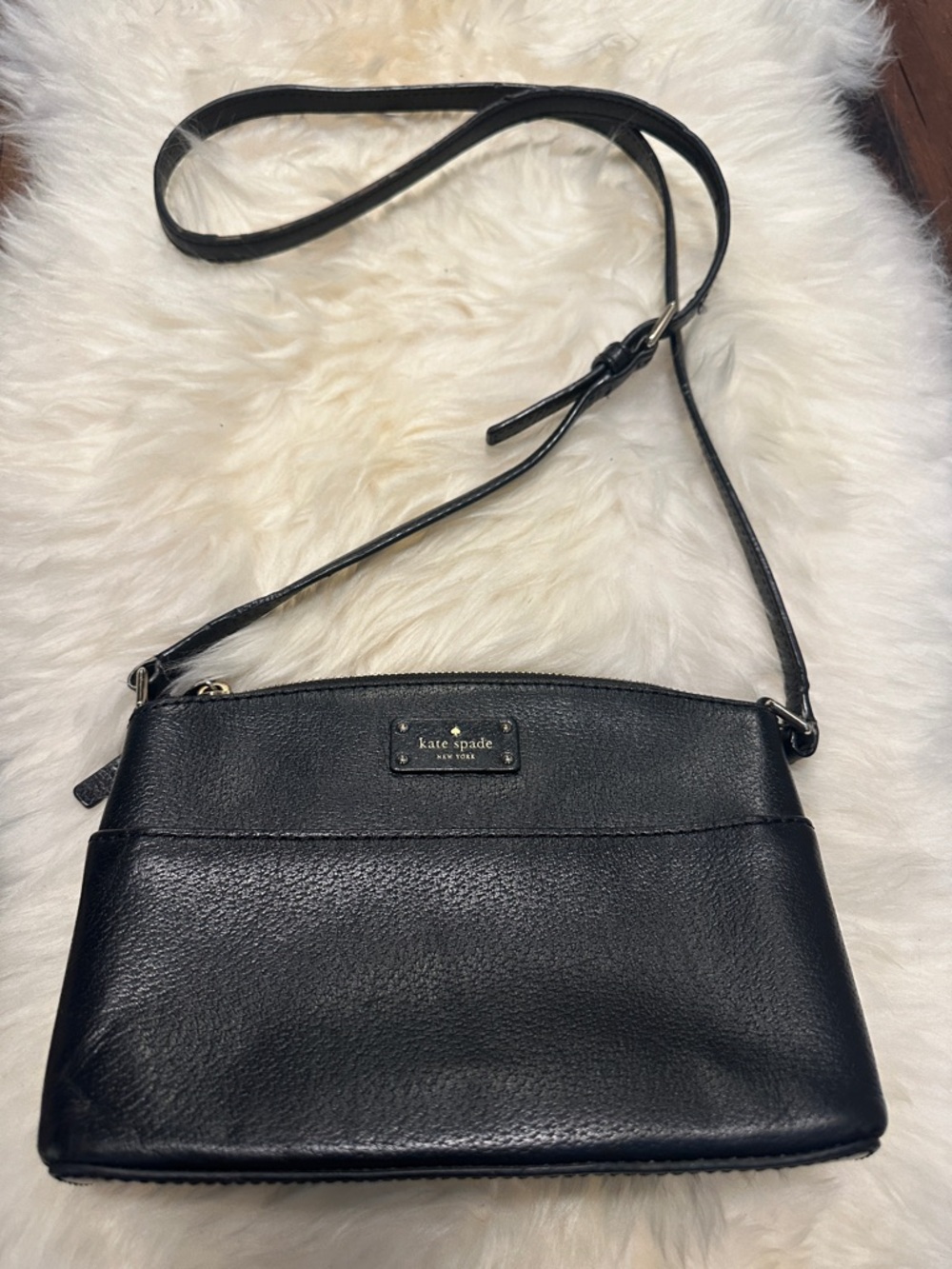 Kate Spade genuine leather black bag( shown in the picture)